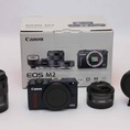 Bán Canon EOS M2 hàng xách Japan kèm theo 2 len Canon flash và nhiều đồ chơi.