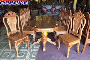 Bộ bàn ăn 8 ghế hoa lá tây chạm hồng bàn ovan BBA2158B