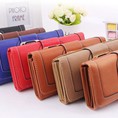 Ví cầm tay nữ dáng dài, thiết kế khóa nổi bật, đơn giản
