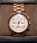 Mình cần bán gấp đồng hồ michael kors 5128 gold watch case 38
