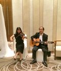 Hình ảnh: Cung cấp Nhạc công chơi Guitar và Violon