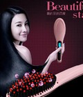 Hình ảnh: lược điện vào nếp tóc
