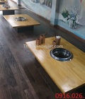 Hình ảnh: Bàn ăn mặt gỗ nhà hàng lẩu nướng than hoa
