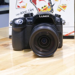 bán máy ảnh Panasonic DMC GH4 và lens OLYMPUS 12 40mm 2.8 PRO