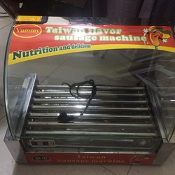 Máy nướng xúc xích 7 thanh 