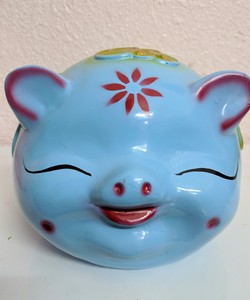 Lợn đất mắt híp cho bé