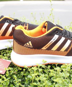 Giầy thể thao trẻ trung màu cam đen