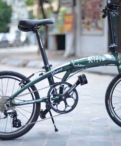 Xe đạp gấp Rifle Patriot khẩu súng trường trên đường quốc lộ