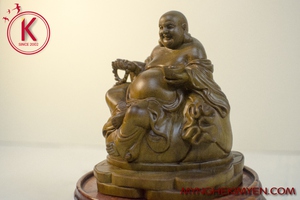 Di Lặc để bàn gỗ Xa Mu