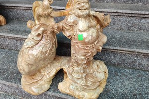 Tượng di lặc kéo bao tiền