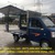 Xe tải nhỏ thùng cánh dơi 770kg chạy trong thành phố.