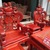 Bộ bàn ghế trạm nghê đỉnh tay khuỳnh vách bát tiên gỗ hương 