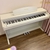 Piano-dien-moi-BOWMAN-CX250-mau-trang-danh-cho-nhung-ban-yeu-thich-su-nhe-nhang