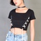 Áo croptop đục lỗ đan dây